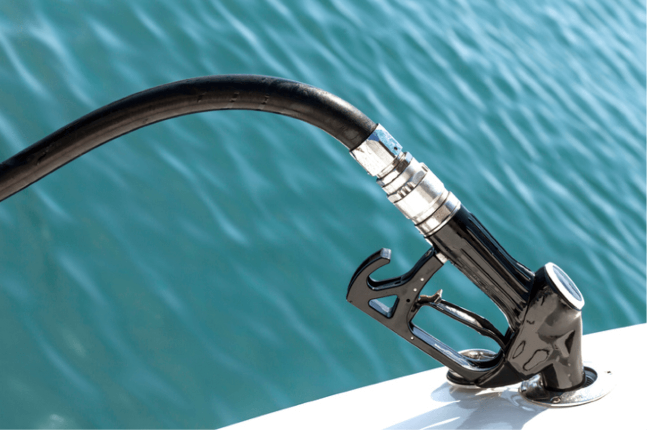 Fueling a houseboat with gas.